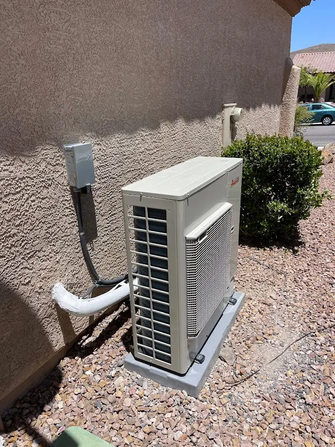 Residential air conditioning condenser unit in Morris